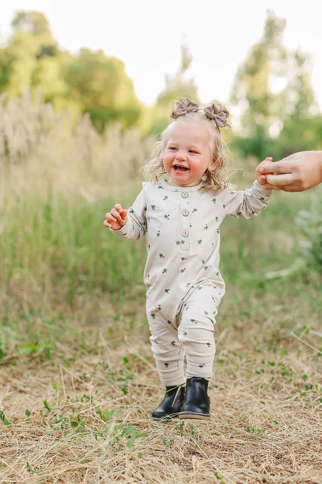 Floral Long Sleeve Button Romper.