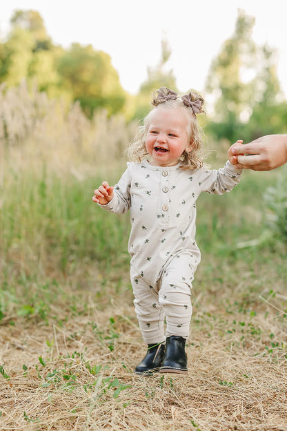 Floral Long Sleeve Button Romper.