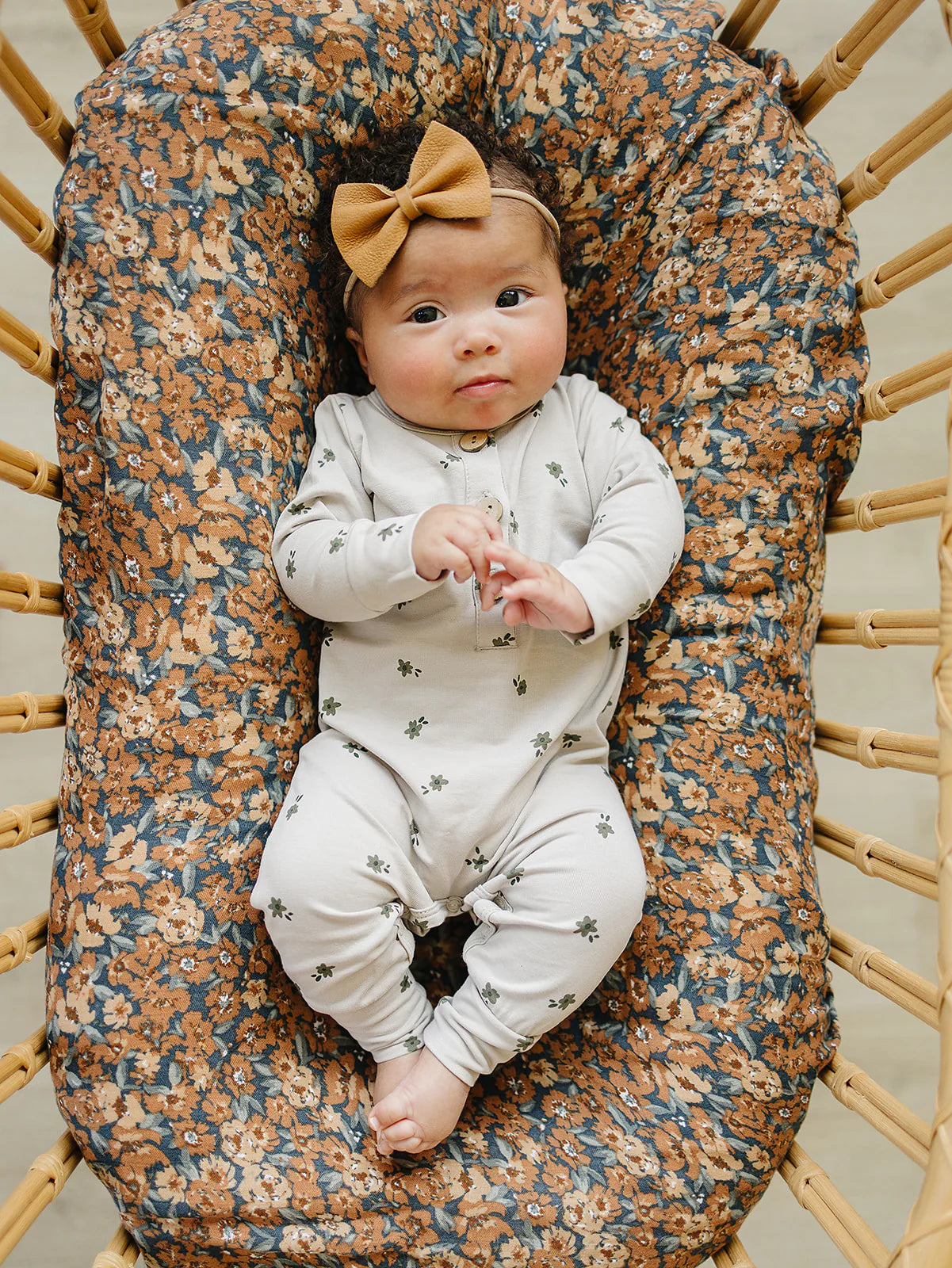 Floral Long Sleeve Button Romper.